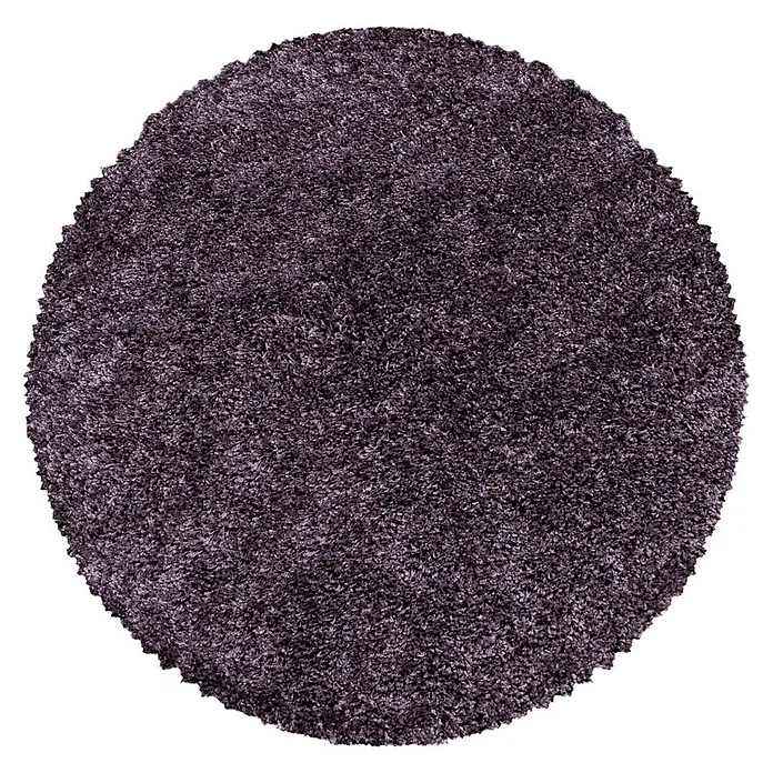 Hochflorteppich Sydney 3000Violett, Durchmesser: 160 cm, 100% Polypropylen - Nahaufnahme eines runden, lilafarbenen Shaggy-Teppichs mit weicher Textur, ideal für eine gemütliche Atmosphäre.