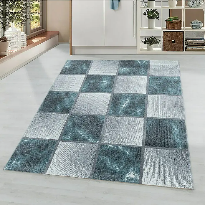 Kurzflorteppich Ottawa 4201Blau, 250 x 80 cm, 100% Polypropylen - Ein rechteckiger Teppich mit einem Schachbrettmuster aus grauen und blauen Quadraten, der eine moderne Note verleiht.