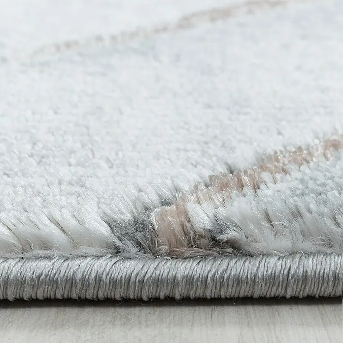 Kurzflorteppich Naxos 3811 - Bronze, 200 x 140 cm, 80% Polypropylen, 20% Polyester - Nahaufnahme eines Teppichs mit weicher Textur und modernem Design, ideal für ein gemütliches Zuhause.