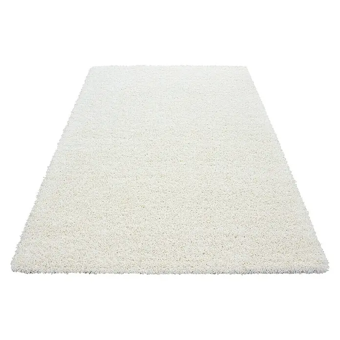 Hochflorteppich Dream 4000Cream, 110 x 60 cm, 100 % Polypropylen - Ein weißer, flauschiger Teppich, ideal, um jedem Raum Wärme und Komfort zu verleihen. Seine weiche Textur macht ihn zu einer einladenden Ergänzung für Ihr Zuhause.