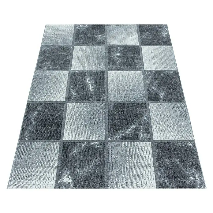 Kurzflorteppich Ottawa 4201 - Grau, 200 x 140 cm, 100% Polypropylen - Nahaufnahme eines quadratischen Teppichs mit einem Schachbrettmuster in Grau- und Schwarztönen, perfekt für moderne Innenräume.