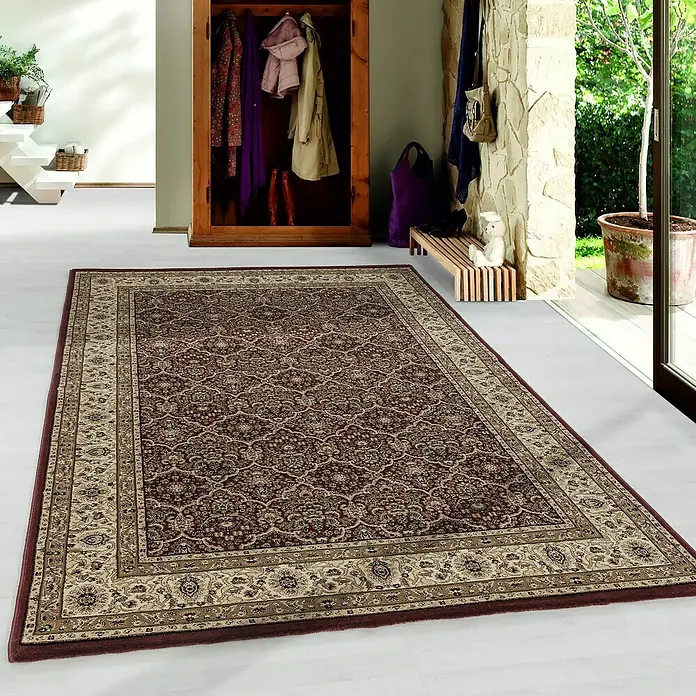 Kurzflorteppich Kashmir 2602Rot, 150 x 80 cm, 100% Polypropylen - Ein detailreicher Teppich mit floralem Muster in warmen Brauntönen, der dem Raum Eleganz und Wärme verleiht. Perfekt für Flur oder Wohnbereich.