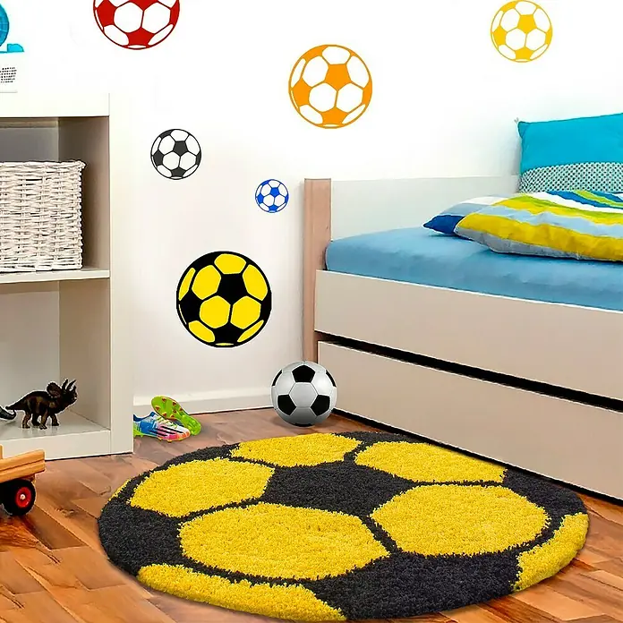 Kinderteppich Fun 6001 - Gelb, Durchmesser: 100 cm, 100% Polypropylen - Runder Fußballteppich in Gelb und Schwarz im Kinderzimmer, passend zu den Fußballaufklebern an der Wand.