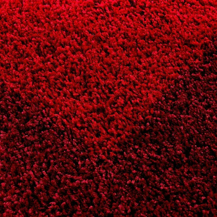 Hochflorteppich Life 1503 - Rot, Durchmesser: 200 cm, 100% Polypropylen - Detailaufnahme eines roten Teppichs mit dichter, flauschiger Textur, ideal für Wärme und Komfort in jedem Raum.