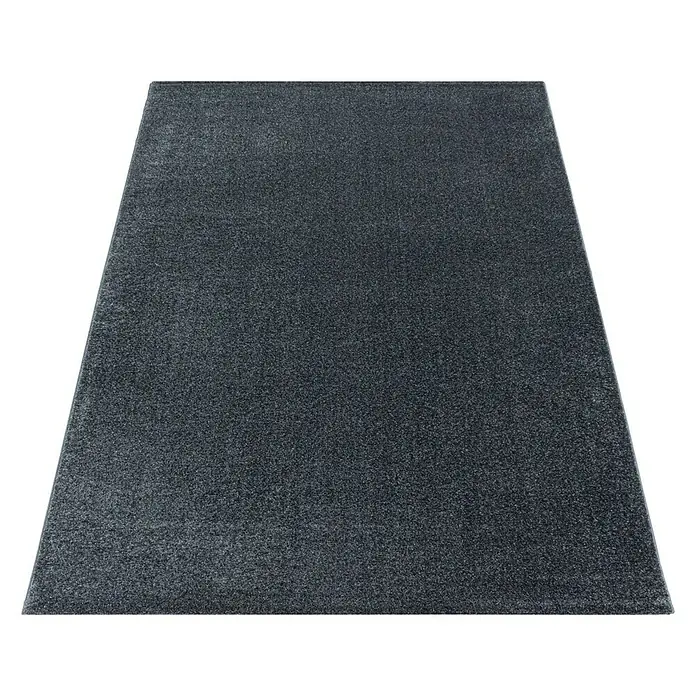 Hochflorteppich Rio 4600 - Grau, 150 x 80 cm, 100% Polypropylen - Rechteckiger, dunkelgrauer Teppich mit feiner Textur. Der Teppich liegt flach auf einem schwarzen Untergrund.