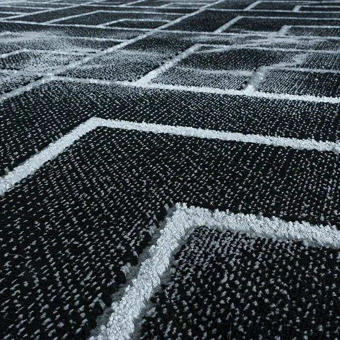 Kurzflorteppich Naxos 3814Silber, 200 x 140 cm, 80% Polypropylen, 20% Polyester - Nahaufnahme eines modernen Teppichs mit grafischem Muster in Schwarz und Weiß für stilvolle Wohnräume.
