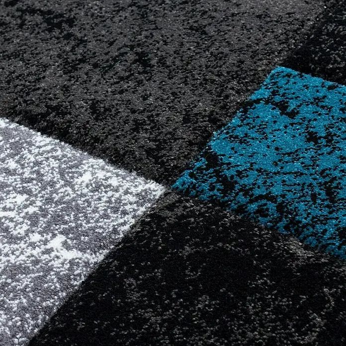 Kurzflorteppich Hawaii 1330 - Türkis, 290 x 200 cm, 100 % Polypropylen - Nahaufnahme eines modernen Teppichs mit geometrischen Mustern in Grau, Weiß und Türkis, ideal für ein stilvolles Zuhause.