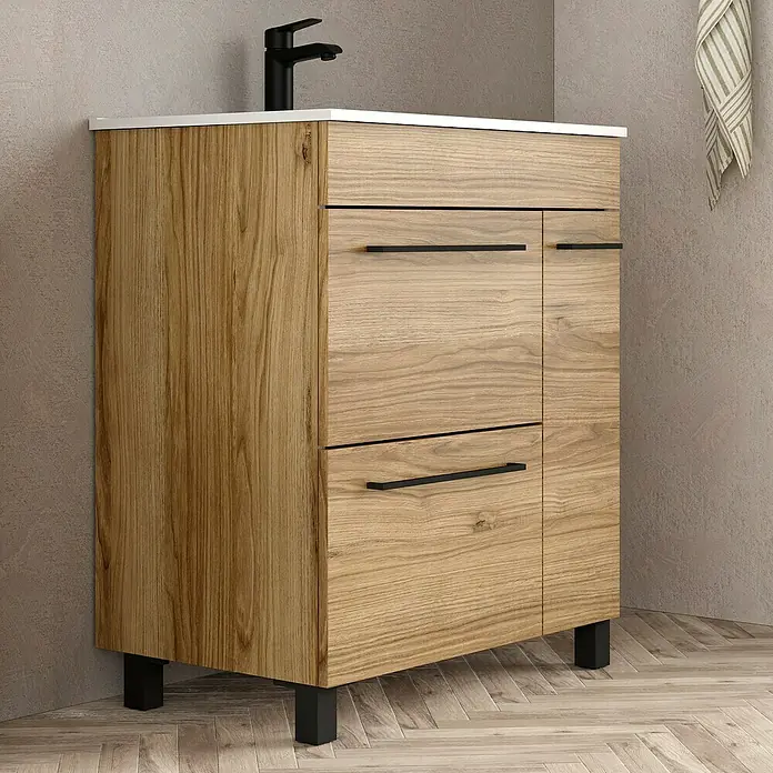 Artysan Mueble bajo de lavabo Tabarca - L x An x Al: 44,6 x 70 x 83,3 cm, Roble Guadarrama - Mueble de baño de madera clara con tiradores y accesorios negros, que combina funcionalidad con diseño moderno.