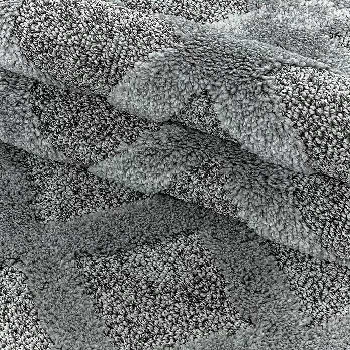 Hochflorteppich Pisa 4702 - Grau, 150 x 80 cm, 100% Polypropylen - Grauer, gemusterter Teppich mit weichen, hochflorigen und Schlingen-Texturen, gefaltet.