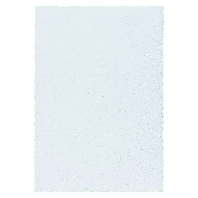 Hochflorteppich Sydney 3000 - Weiß, 150 x 80 cm, 100 % Polypropylen - Nahaufnahme eines weißen, strukturierten Blattes Papier mit unregelmäßigen Rändern, ideal für künstlerische Projekte und kreative Anwendungen.