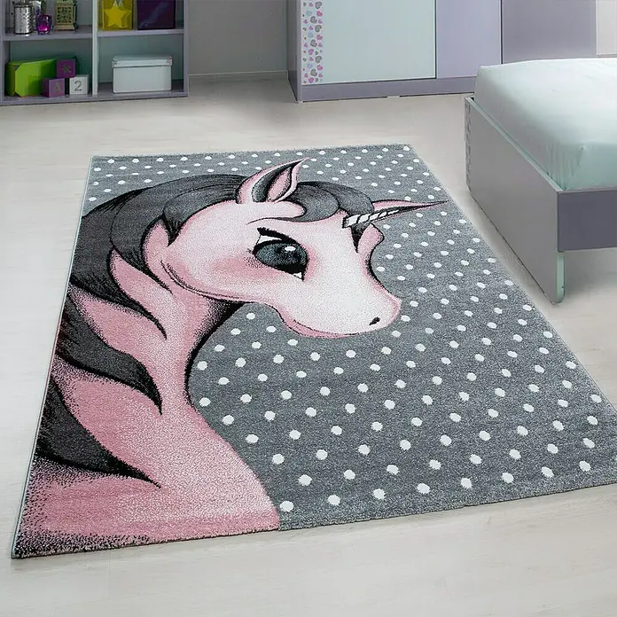 Kinderteppich Kids 0590 - Pink, 170 x 120 cm, 100 % Polypropylen - Ein Kinderzimmerteppich mit einem Einhornmotiv und weißen Punkten auf grauem Hintergrund. Perfekt für Mädchenzimmer.