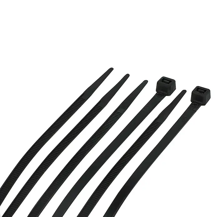 Voltomat Bridas para cables - An x L: 48 x 200 mm, Plástico, Negro - Un primer plano de seis bridas de plástico negras dispuestas en diagonal, destacando la versatilidad de estos elementos de sujeción.