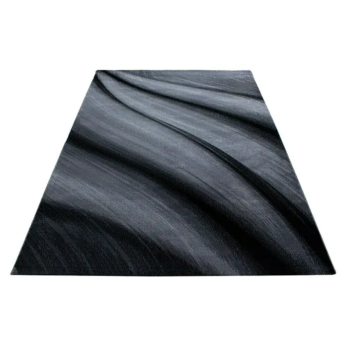 Kurzflorteppich Miami 6630 - Schwarz, 300 x 80 cm, 100% Polypropylen - Nahaufnahme eines eleganten, grauen Teppichs mit einem dynamischen, wellenförmigen Muster, das jedem Raum einen Hauch von Bewegung verleiht.