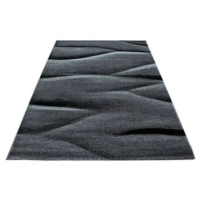 Kurzflorteppich Lucca 1840Schwarz, 170 x 120 cm, 100 % Polypropylen - Ein moderner grauer Teppich mit wellenförmigen Mustern, der jedem Raum einen Hauch von Eleganz und Komfort verleiht.