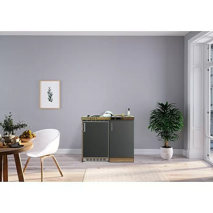 Respekta Miniküche Levin - Breite: 100 cm, Grau, Mit Duo-Kochmulde - Dunkelgraue Miniküche mit Messing-Arbeitsplatte, Kochfeld und Spüle, in einem modernen Wohnraum.