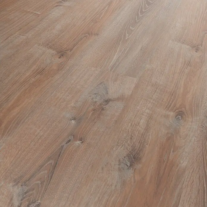 Star Clic Vinylbodenmuster More+ Smoky Oak Gold - 280 x 160 x 5 mm, Landhausdiele - Nahaufnahme eines Laminatbodens in hellbrauner Holzoptik, der eine warme und natürliche Atmosphäre vermittelt.