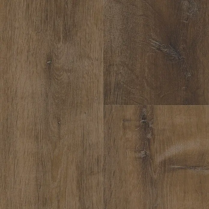 Star Clic Vinylboden More+ - Golden Oak Brown, Landhausdiele, 1.210 x 220 x 5 mm - Detailaufnahme eines robusten Holzfußbodens mit markanter Maserung und warmen Brauntönen.