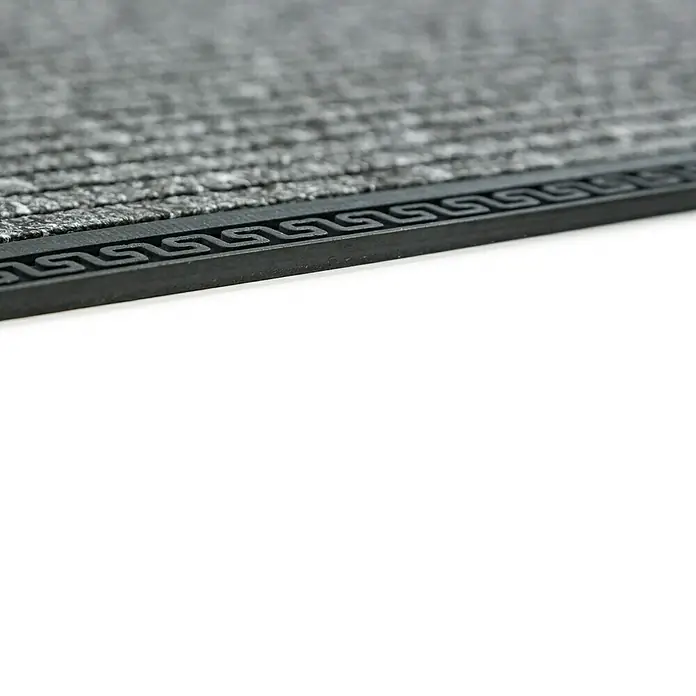 Astra Border Star Fußmatte - Grau, 70 x 40 cm, Kunststoff - Detailaufnahme einer grauen Fußmatte mit einem schwarzen Rand mit griechischem Mäandermuster, ideal für den Eingangsbereich.