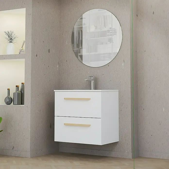 Artysan Mueble bajo de lavabo Colom - Blanco - La imagen muestra un mueble de baño blanco con dos cajones y tiradores dorados debajo de un espejo redondo sobre una pared gris.