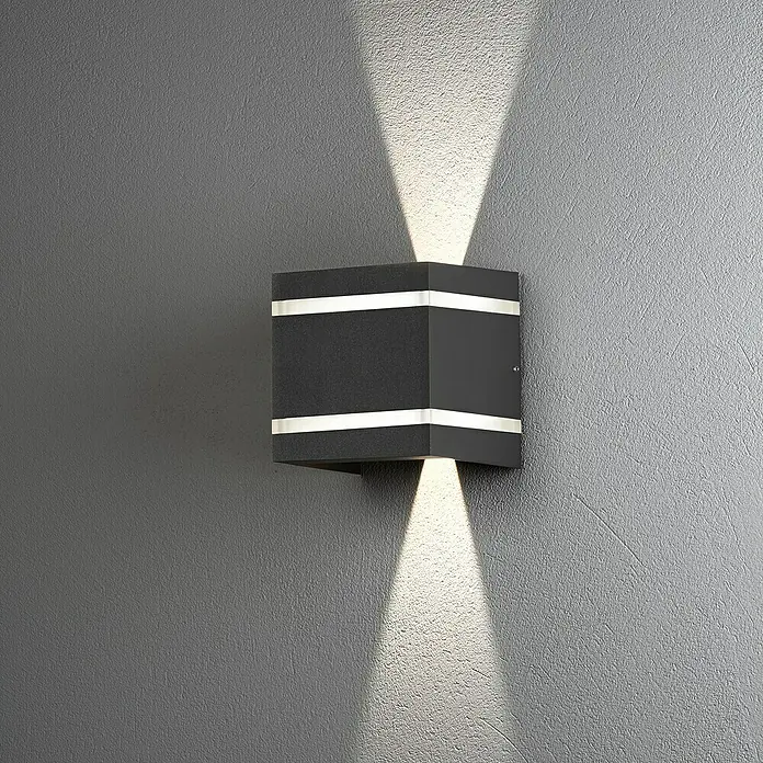 Konstsmide LED-Außenwandleuchte - 7,2 W, 4 x 18,5 x 9,5 cm, Weiß, IP54 - Moderne schwarze Wandleuchte mit LED-Beleuchtung, die ein helles, nach oben und unten gerichtetes Licht erzeugt und eine stilvolle Atmosphäre schafft.