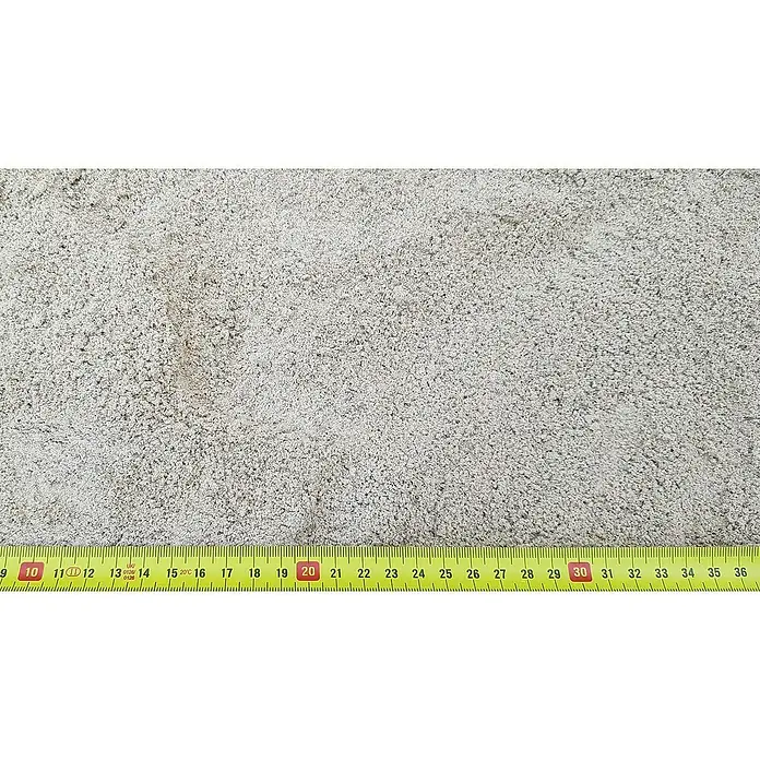 BHS Mallorca Big Bag de grava 0 - Gris - Primer plano de una alfombra gris con una cinta métrica amarilla que destaca la textura de la fibra y las dimensiones.