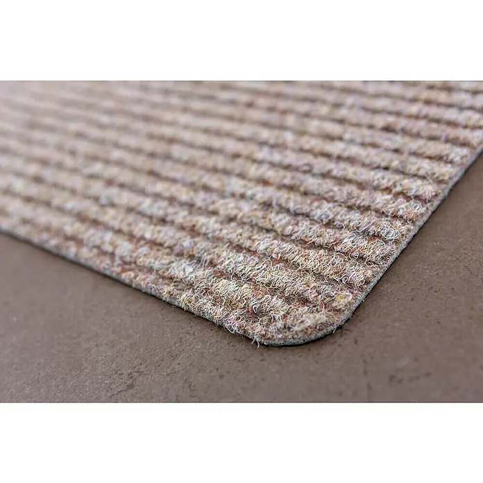 Astra Fußmatte Rib Line Sprint - 50 x 80 cm, Beige, 100 % Polypropylen - Nahaufnahme einer Fußmatte mit gerippter Textur in Erdtönen, ideal für den Eingangsbereich und zur Schmutzabweisung.