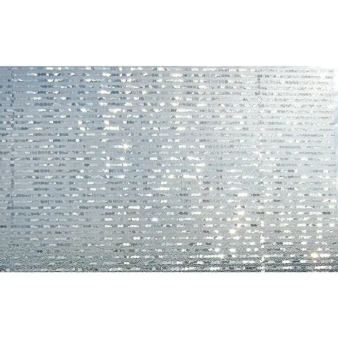 Lámina para ventana al corte Viena - Ancho: 92 cm, Transparente - Primer plano de una lámina de ventana texturizada, que refracta la luz para la privacidad permitiendo brillo.