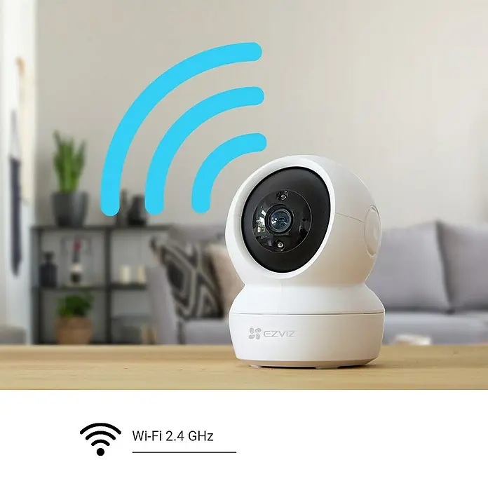 EZVIZ Cámara de vigilancia C6N - Blanco, Ángulo de detección: 360 °, Alcance de detección: 10 m - Primer plano de una cámara de seguridad EZVIZ blanca, con símbolos WiFi en primer plano, lo que sugiere conectividad.