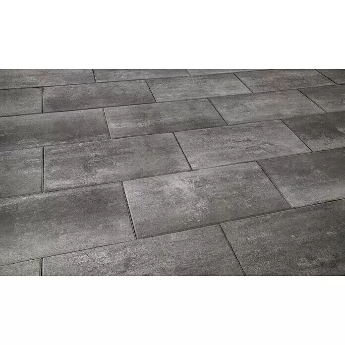 EHL Terrassenplatte Grande - 80 x 40 x 5 cm, Nero, Beton - Graue rechteckige Pflastersteine bilden eine strukturierte Außenfläche.