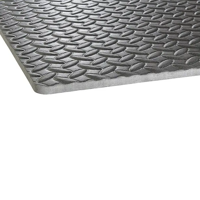 Mottez Vibrationsdämpfungsmatte - Grau - Eine Nahaufnahme einer grauen, strukturierten Schaumstoffmatte, ideal als Bodenbelag für Fitnessstudios oder Spielbereiche.