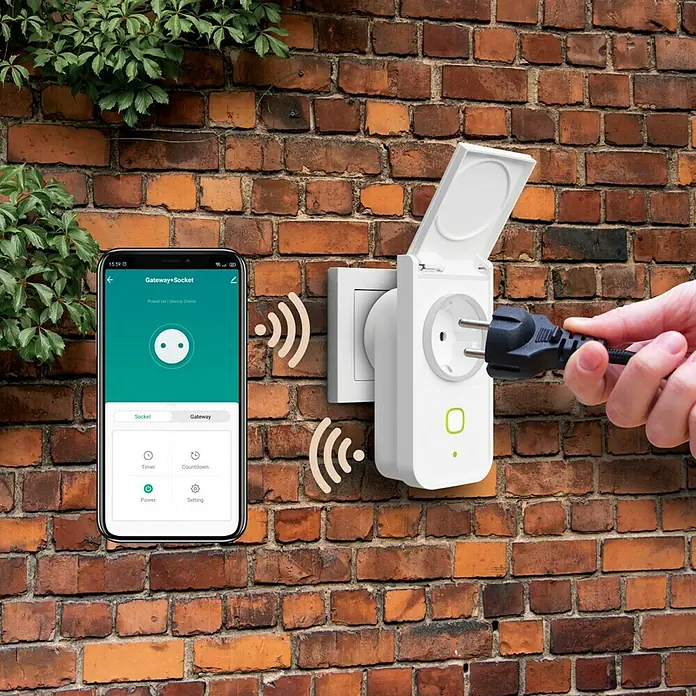 Muvit iO Enchufe inteligente WiFi + Hub Bluetooth Mesh - Para exterior, IP44, Blanco, 16 A - Enchufe inteligente para exteriores con control por smartphone y tapa protectora para una alimentación segura en el jardín.