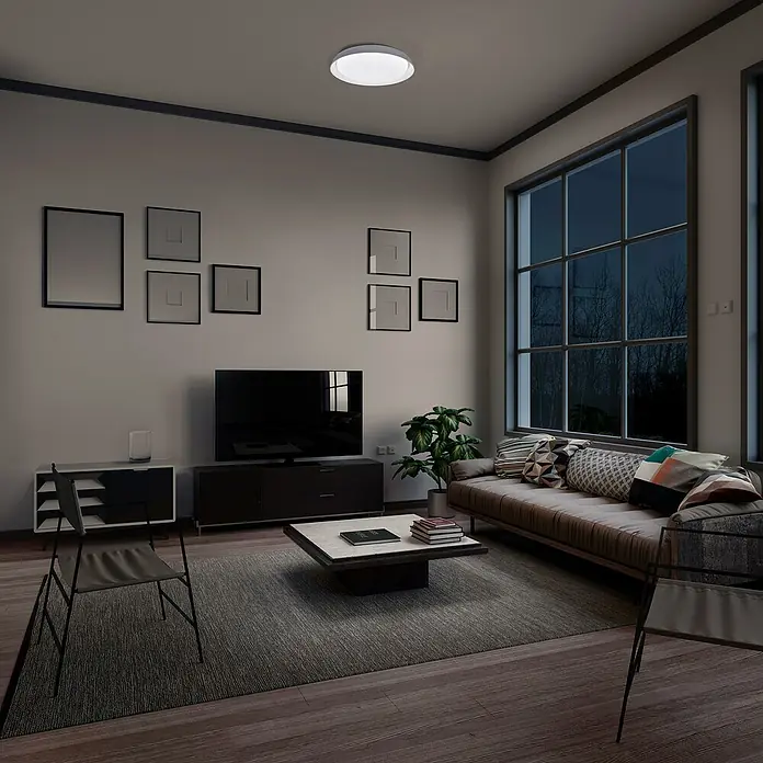 Ledvance SUN@Home LED-Wand- & Deckenleuchte rund Orbis Plate - 26 W, Ø x H: 43 x 7 cm, Weiß, Kaltweiß - Das Bild zeigt eine moderne Deckenleuchte in einem stilvollen Wohnzimmer mit dunklen Akzenten und gemütlicher Atmosphäre.
