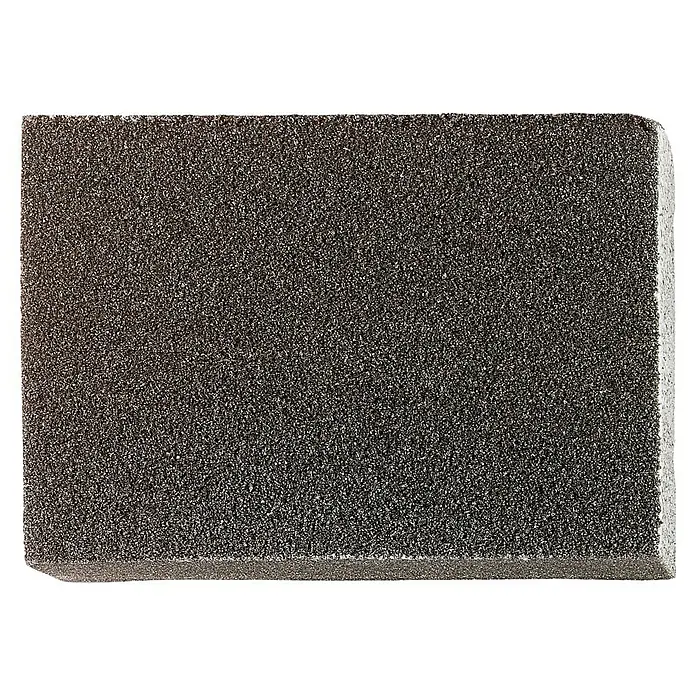 Taco de lijado Fino/Medio - L x An x Al: 100 x 70 x 25 mm - Primer plano de un bloque de lijado gris oscuro con una superficie rugosa, ideal para lijar diversos materiales.