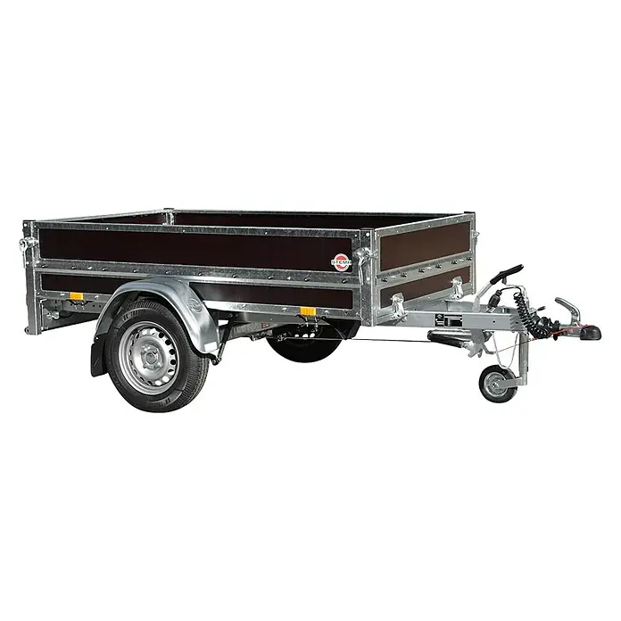 Stema Anhänger WOODOXX 1000 mit Bordwandaufsatz u. Flachplane - Nutzlast: 728 kg, Einachser, Kasteninnenmaß: 201 x 115 x 80 cm, Gebremst - Ansicht eines Stema Anhängers mit Kippvorrichtung, ideal für Lasten. Der Anhänger ist robust, zuverlässig und bereit für den Transport.