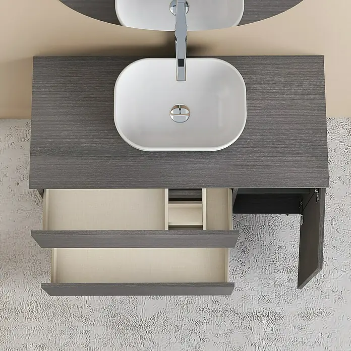 Artysan Conjunto de mueble de baño Oval - Ancho: 80 cm, Ceniza, 4 pzs. - Vista superior de un moderno tocador con acabado de madera gris, lavabo sobre encimera blanco y cajones abiertos.