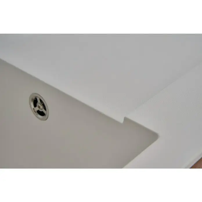Respekta Einbauspüle Denver - 78 x 43,5 cm, Weiß - Nahaufnahme einer Spüle aus Corian mit einem sauberen Design und einem Ablauf, die die moderne Ästhetik und Funktionalität hervorhebt.