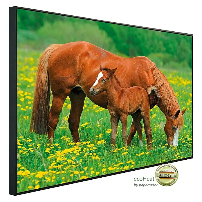 Papermoon Infrarot-Bildheizkörper Pferde - 120 x 60 cm, 1.000 W - Das Infrarot-Heizpaneel zeigt eine Stute mit Fohlen auf einer Blumenwiese, gerahmt in Schwarz. Premium-Qualität für behagliche Wärme.