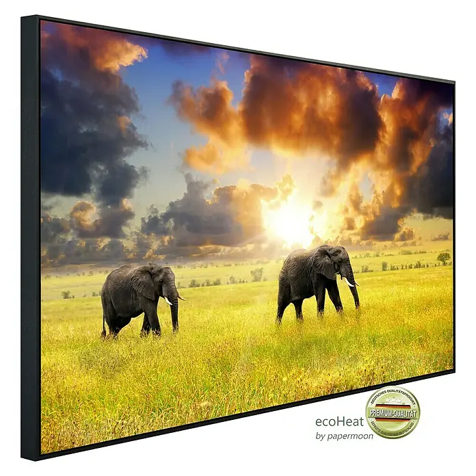 Papermoon Infrarot-Bildheizkörper Afrikanische Elefanten - 120 x 60 cm, 1.200 W - Leinwandbild mit Elefanten in der Savanne bei Sonnenuntergang. Hochwertiger Kunstdruck mit edlem Rahmen für Ihr Zuhause.