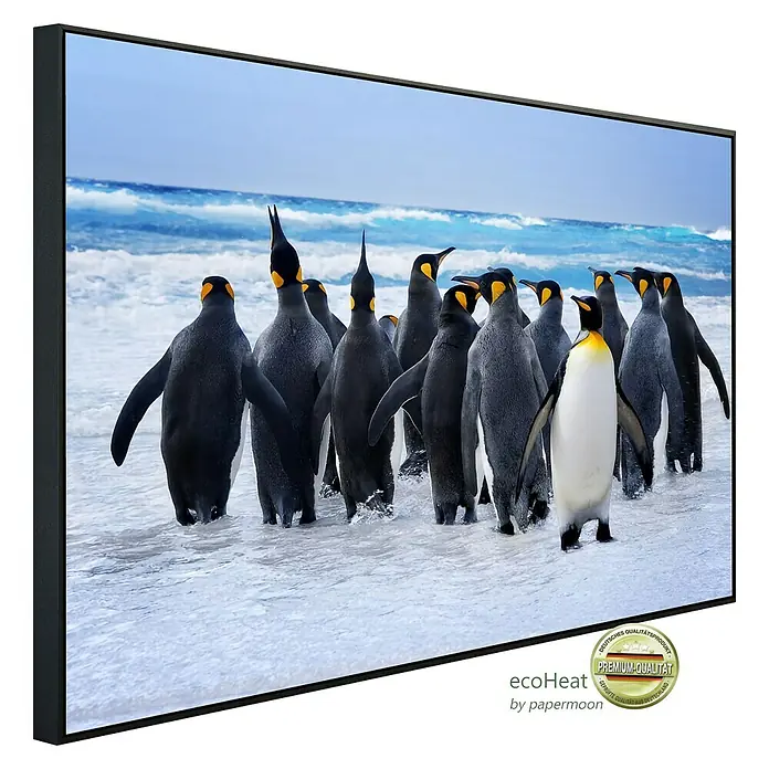 Papermoon Infrarot-Bildheizkörper Königspinguine - 120 x 60 cm, 1.200 W - Ein gerahmtes Bild mit einer Gruppe von Pinguinen im Schnee, ein Premium-Qualitätsprodukt.
