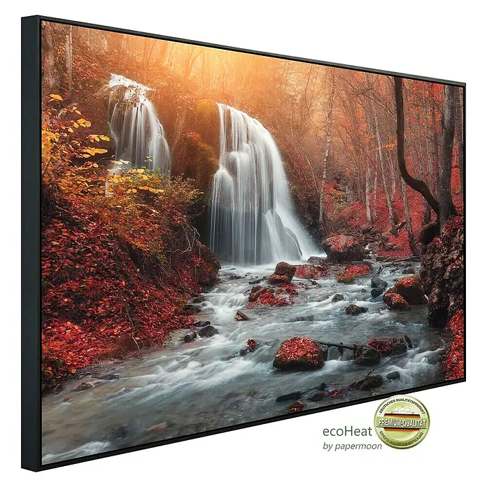 Papermoon Infrarot-Bildheizkörper Berg Sonnenuntergang Wasserfall - 60 x 50 cm, 350 W - Nahaufnahme eines gerahmten Leinwandbildes, das einen malerischen Wasserfall im Herbstwald zeigt. Perfekte Wanddekoration für ein gemütliches Zuhause.