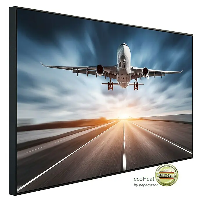 Papermoon Infrarot-Bildheizkörper Flugzeugstraße Sonnenuntergang - 100 x 60 cm, 600 W - Das Bild zeigt ein modernes Infrarot-Heizpaneel mit Flugzeugmotiv. Es ist in einem schlanken, schwarzen Rahmen gefasst und bietet effiziente Wärme.