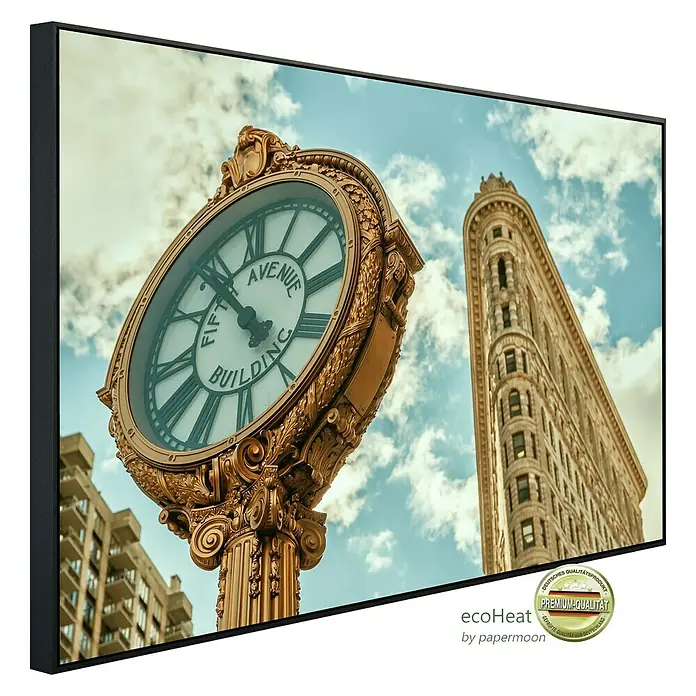 Papermoon Infrarot-Bildheizkörper Flatiron New York - 120 x 60 cm, 1.000 W - Gerahmtes Wandbild mit einer goldenen Uhr und dem Flatiron Building in New York. Hochwertiger Kunstdruck für stilvolle Innenräume.