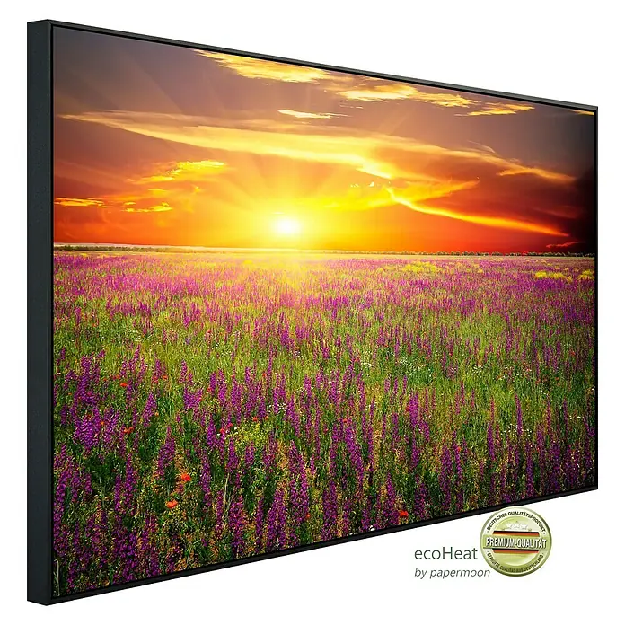 Papermoon Infrarot-Bildheizkörper Blumenwiese Sonnenuntergang - 90 x 50 cm, 450 W - Das Bild zeigt eine hochwertige Leinwand mit einem farbenprächtigen Sonnenuntergang über einem blühenden Feld, gerahmt für eine elegante Wanddekoration.