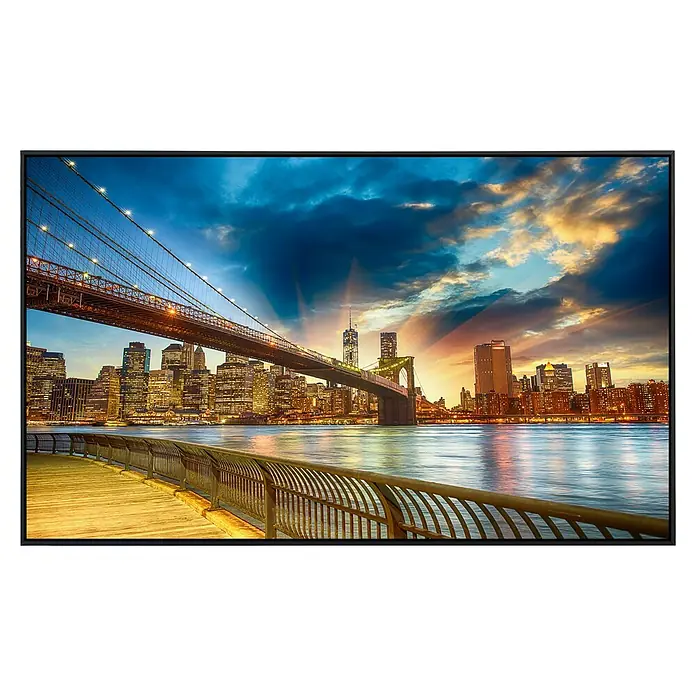 Papermoon Infrarot-Bildheizkörper Manhattan Sonnenuntergang - 120 cm x 600 mm, 1.000 W - Dieser LCD-Monitor zeigt ein wunderschönes Bild der Brooklyn Bridge bei Nacht, mit sanften Lichteffekten im Hintergrund.