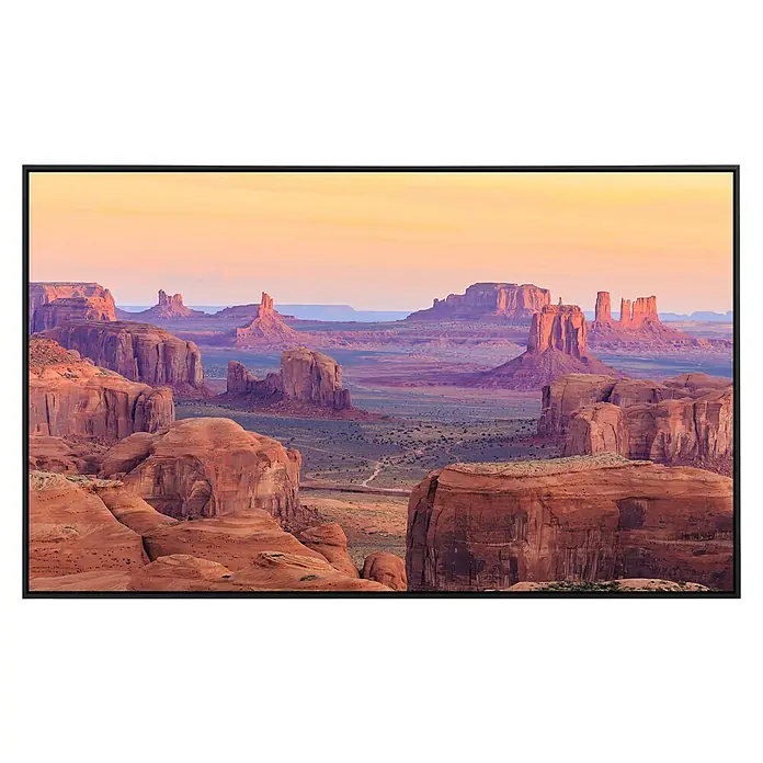 Papermoon Infrarot-Bildheizkörper Jagt Mesa Sunrise - 60 x 50 cm, 350 W - Der Flachbildfernseher zeigt eine atemberaubende Wüstenlandschaft mit roten Felsen und einem farbenprächtigen Sonnenuntergang.
