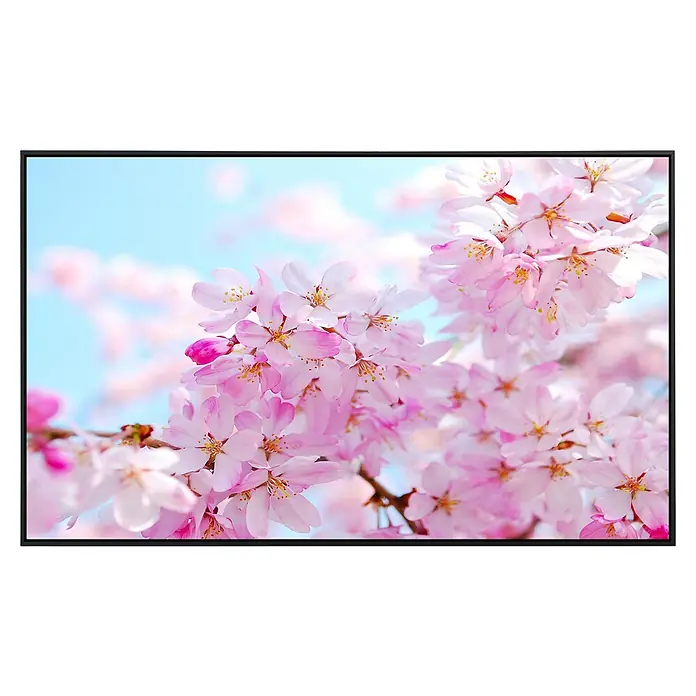 Papermoon Infrarot-Bildheizkörper Kirschblüte 1 - 100 x 60 cm, 600 W - Schwarzer Bilderrahmen mit rosa Kirschblüten-Motiv vor einem hellblauen Hintergrund. Der Rahmen betont die zarten Blüten und die friedliche Atmosphäre.