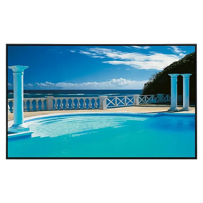 Papermoon Infrarot-Bildheizkörper Blick auf den Pool - 1.200 x 600 mm, 1.200 W - Einladender Pool mit Säulenblick auf das Meer, gerahmt in einem modernen schwarzen Rahmen. Ideal für Entspannung und stilvolle Dekoration.