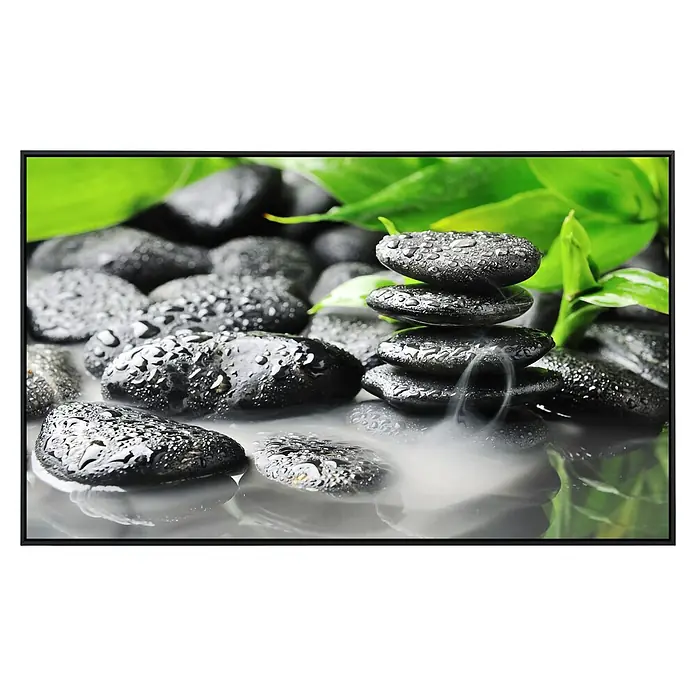 Papermoon Infrarot-Bildheizkörper Zen Basaltsteine - 90 x 50 cm, 450 W - Schwarze Kieselsteine mit Wassertropfen und grünen Blättern in einem meditativen Ambiente, das für Entspannung sorgt.