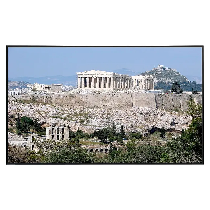 Papermoon Infrarot-Bildheizkörper Parthenon Athen 1 - 100 cm x 600 mm, 600 W - Blick auf die Akropolis von Athen mit den Ruinen antiker Gebäude, eingebettet in eine felsige Landschaft unter blauem Himmel.