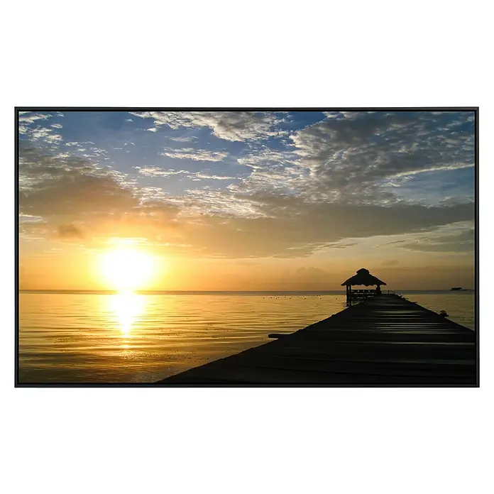 Papermoon Infrarot-Bildheizkörper Sunburst über Belize - 90 x 50 cm, 450 W - Atemberaubender Sonnenuntergang über dem Meer mit einem Steg, der zu einem kleinen Pavillon führt. Die Sonne spiegelt sich golden im Wasser.